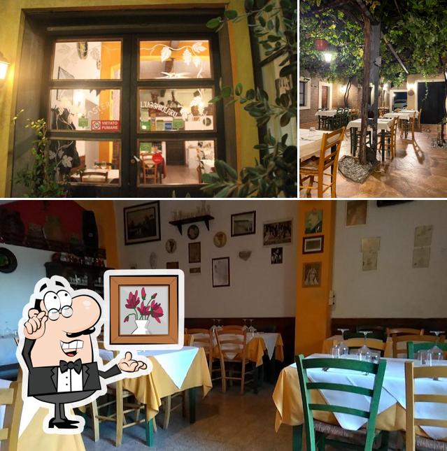 Dai un'occhiata agli interni di Osteria L'Ugghiularu
