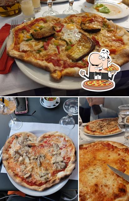 Prenez des pizzas à Chez Renato