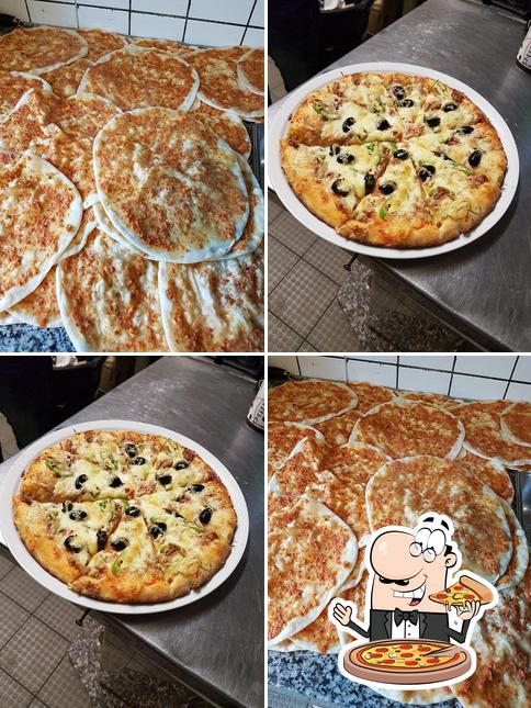 Get pizza at Ada Grill