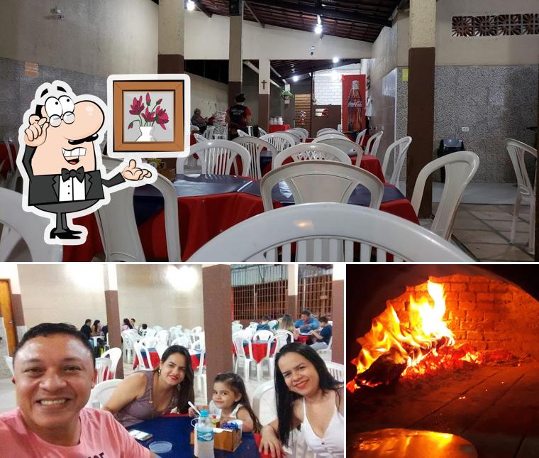 O interior do Pizzaria Forno À Lenha