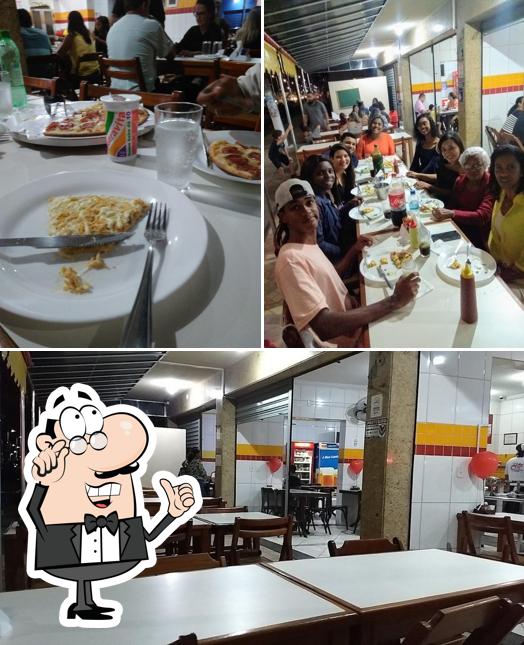 O interior do Pizzaria Elite - Riviera