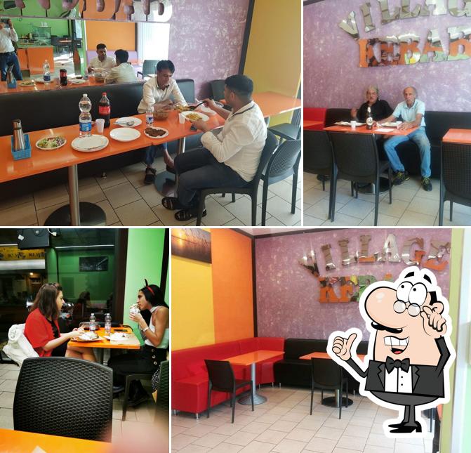 Dai un'occhiata agli interni di Village Kebab di Ullah Zia