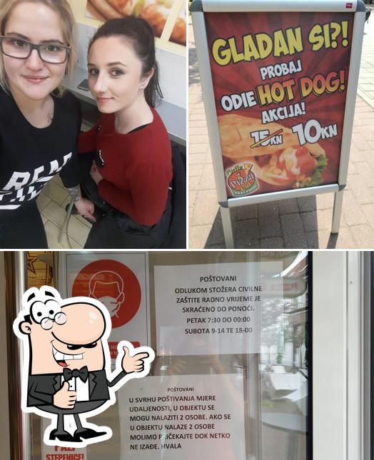 Guarda questa foto di Pizza cut Odie