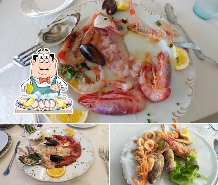 Prenditi la cucina di mare a Ristorante Al Turcotto