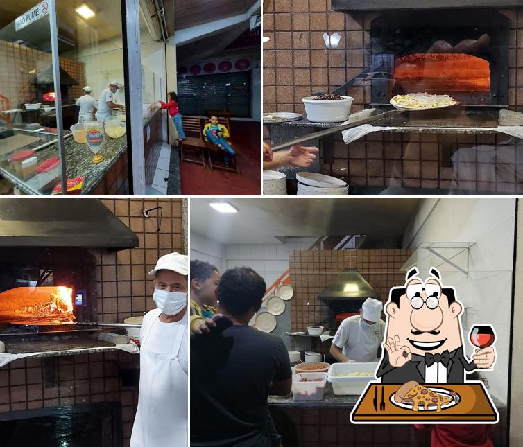 Experimente pizza no Fogo de Lenha Pizzaria