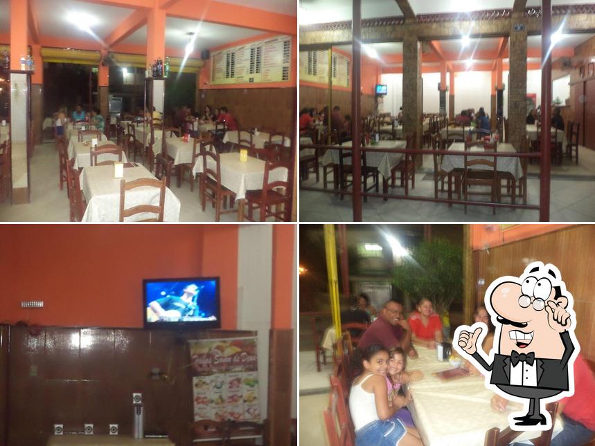 O interior do Pizzaria Zamparole