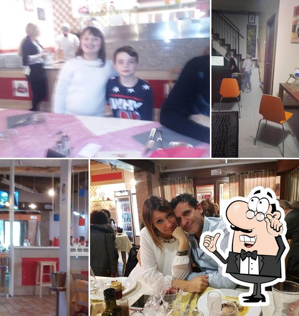 Dai un'occhiata agli interni di Top One Ristorante Pizzeria Griglieria