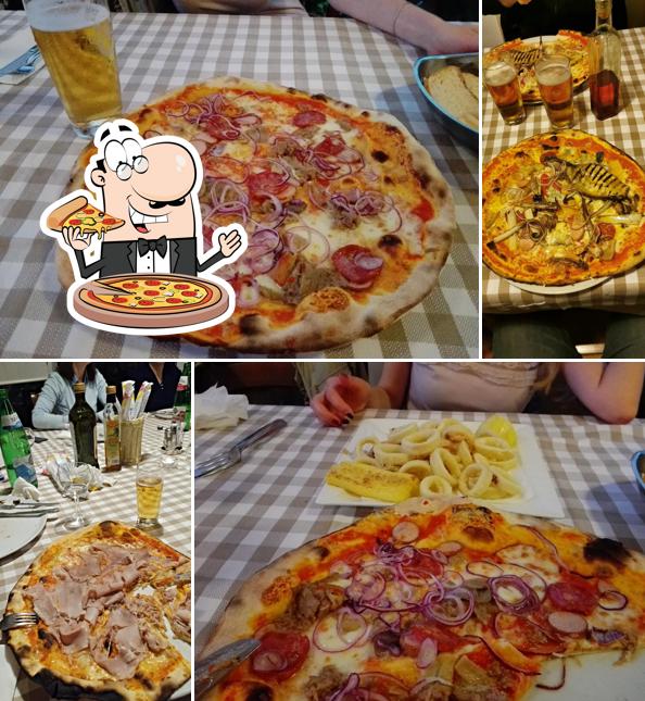 Prenditi una pizza a Pizzeria Trattoria Occhial