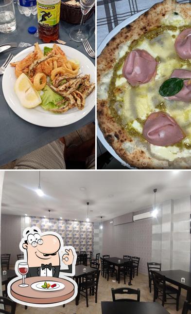 Tra le varie cose da Acatullo Ristorante Pizzeria si possono trovare la cibo e interni