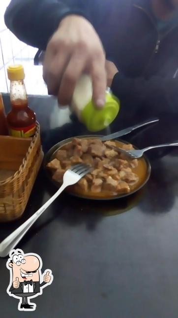 Look at the image of Caldinho & Cia