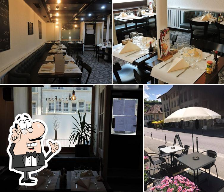 Installez-vous à l'une des tables de Restaurant Fribourg - Café du Paon
