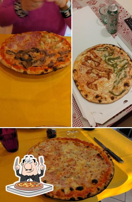 Essayez des pizzas à Pizzeria Quadrifoglio Di Roversi G. Sas