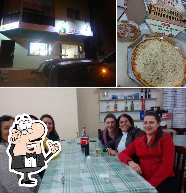 Entre diferentes coisas, interior e comida podem ser encontrados a Pizzaria Roma