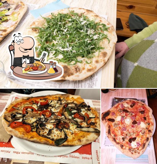 A Pizzeria Ai Pappagalli, vous pouvez prendre des pizzas