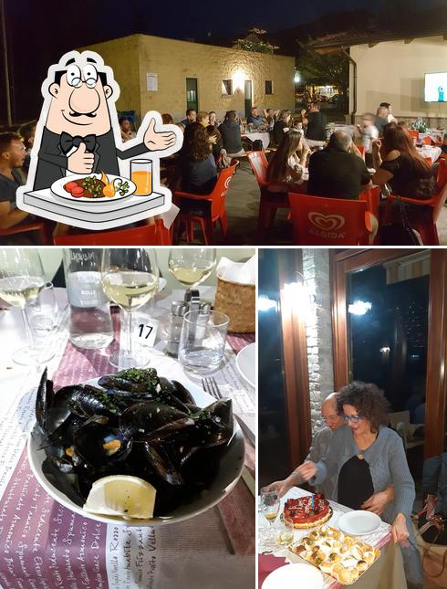 Tra le varie cose da Pizzeria Le Piscine di Prasco si possono trovare la cibo e interni