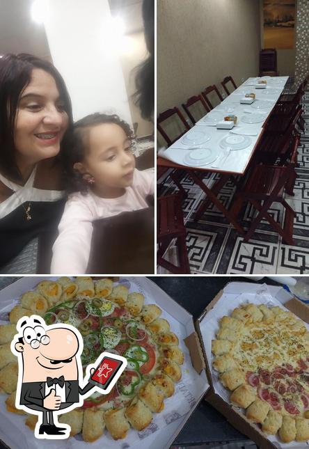 Look at the picture of Pizzaria Nação Das Pizzas