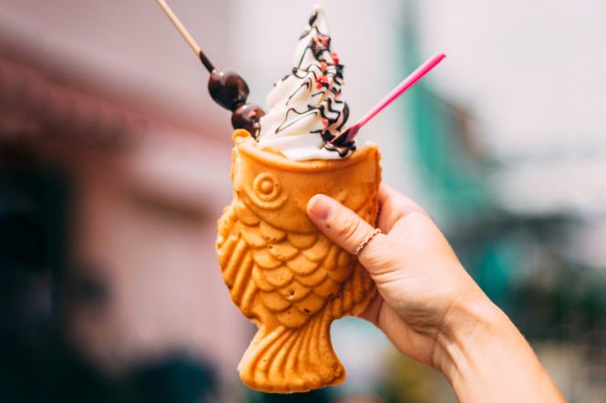Person Holding Fish Shaped Ice Cream Cone. Image by Taryn Elliott from Pexels. 