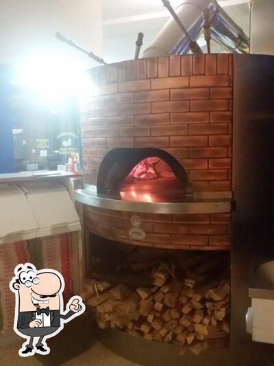 Dai un'occhiata agli interni di DOC Pizzeria
