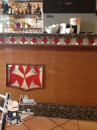 Siediti a un tavolo di Margaret Cafe