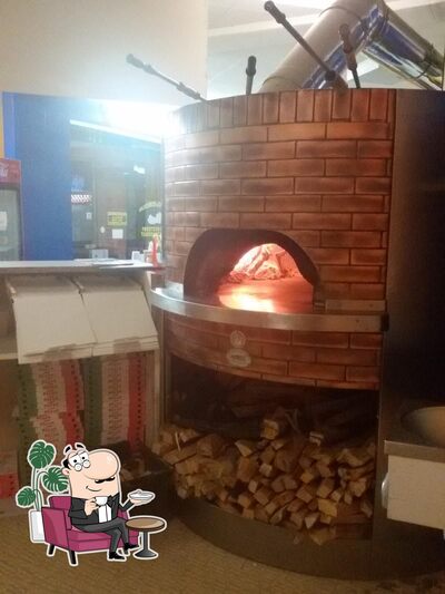 Dai un'occhiata agli interni di DOC Pizzeria