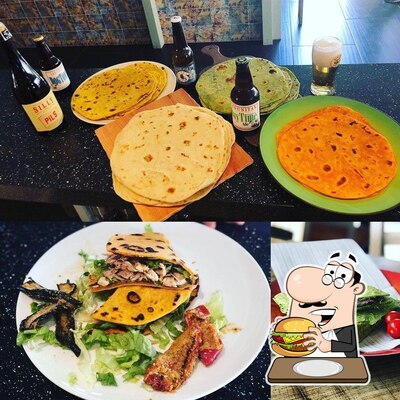 Ordina uno dei tipi di hamburger serviti al pub & bar 2.0 Birreria