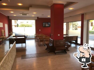 Siediti a un tavolo di Pizza Land