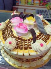 Golden Bakery - Freshly baked cakes and biscuits, birthday decoration material available.