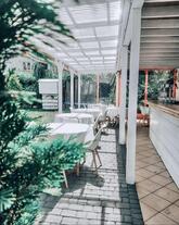 Доставка піци, їжі - ресторан Fat Cat, літній майданчик Osteria