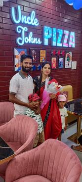 Uncle John's pizza Madho Nagar