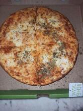 Juno's Pizza - Baking Fresh Since 1974