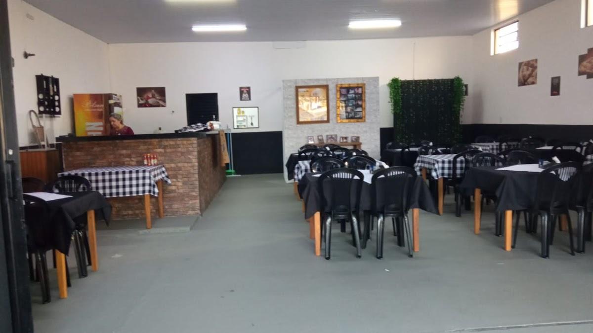 A Nossa Pizza Pizzaria Delivery e no espaço próprio