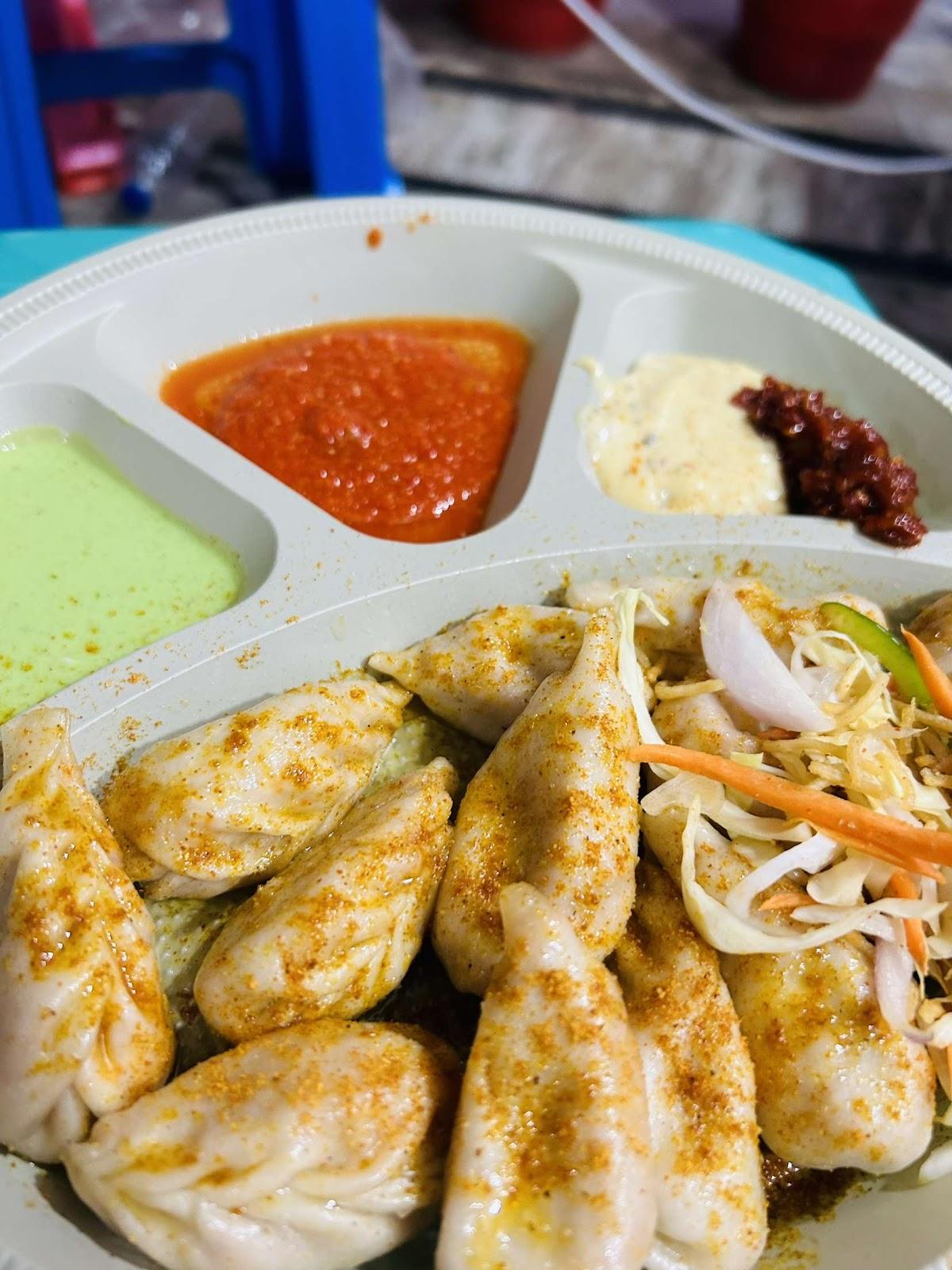 DOLMA BUTTER MOMOS - Best Momos