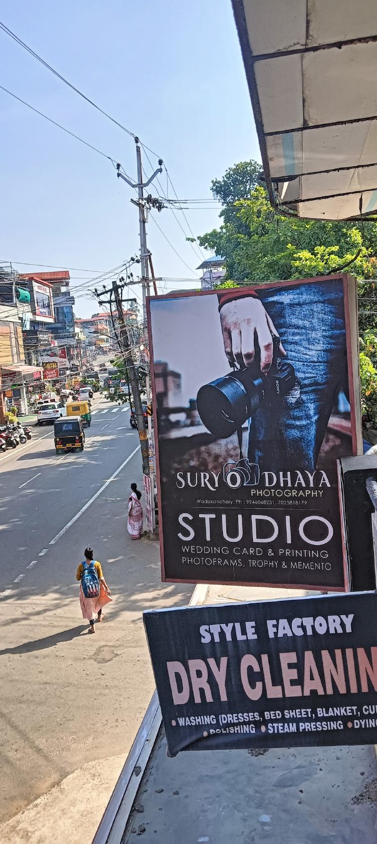 Suryodhaya Wedding studio,.and I'd cards