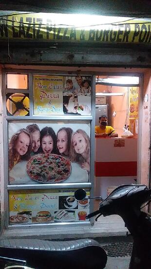 NEW LAZIZ PIZZA AND BURGER POINT , Tauru