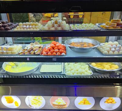 Dedicate Hotel-Restaurant & Naphi Sweets