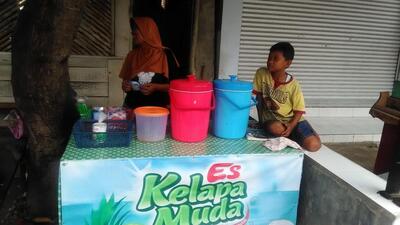 Es Kelapa Muda" Mas Arya"