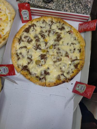 بيتزا الأمانة