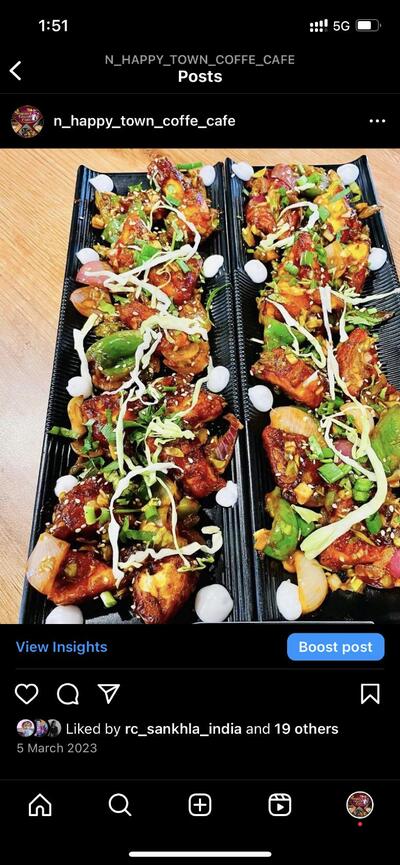 N Happy town cafe and restaurant