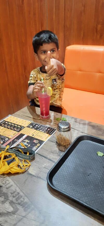 Take a seat at one of the tables at One Bite Malvan